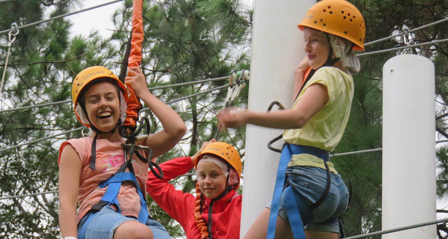 Yr 7 Genesis students enjoy the challenge of the high ropes course at Luther Heights